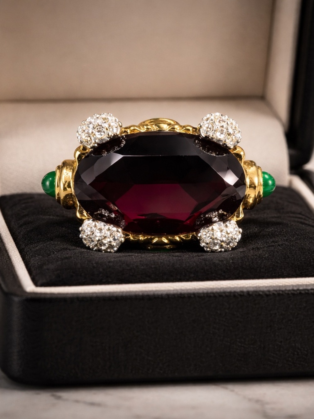 Gold-Tone Purple Oval Cocktail Ring with Green Accent Stones